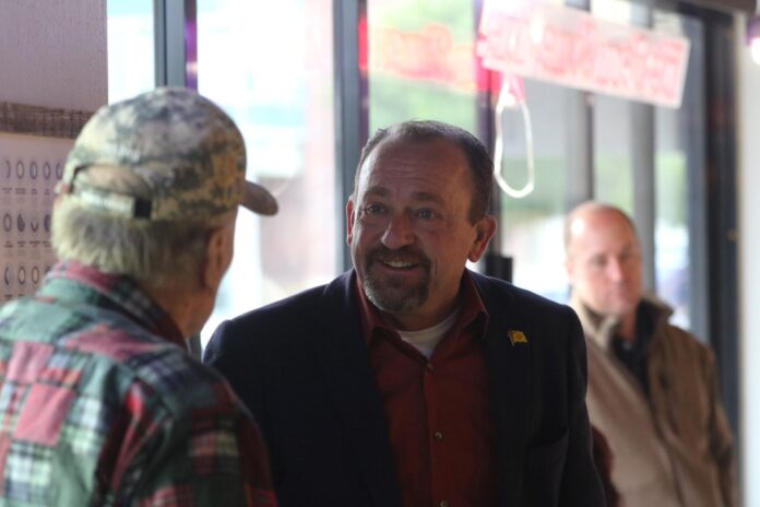 Gregg Hull, GOP primary candidate for governor of New Mexico, speaks with residents during a campaign stop, April 14, 2026 at Kith and Kin.