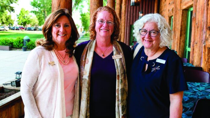 Cindy Padilla (left) outgoing executive director, Michelle Wilde, UWNNM board chair; and Donna Milanovich, newly appointed executive director.