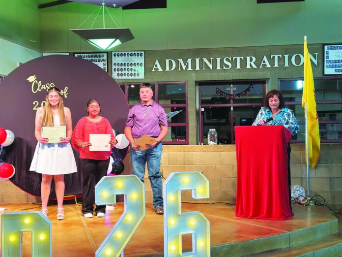 The Chama Peak Land Alliance scholarship winners are Abryanna Baca (left), Sierra Salazar and Miguel Martinez; CPLA Board of Directors member Tina Martinez is also pictured.