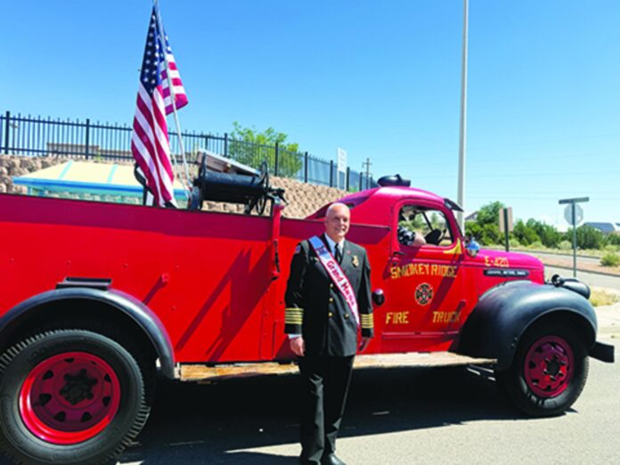 (SUNfoto by Jennifer Garcia)Española Fire Chief John Wickersham was named the grand marshal for the 2026 Española Fiesta Grand Parade. He rode on the back of this