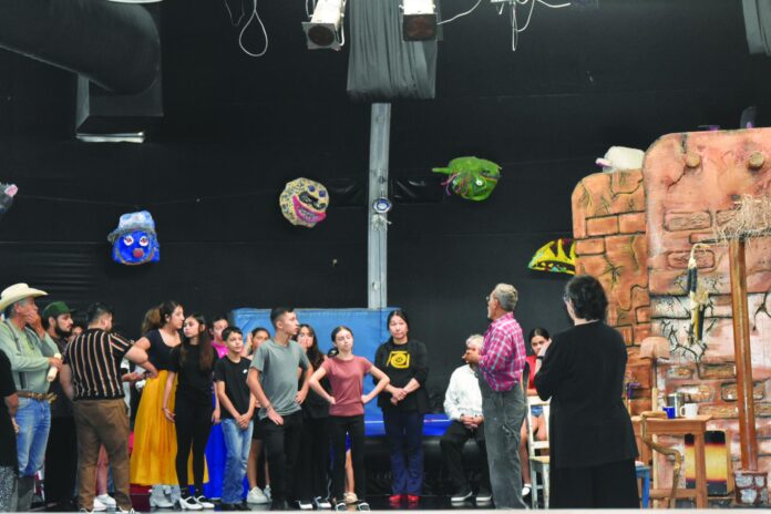 Students rehearse their parts in “El Agua Es Vida” on July 23.