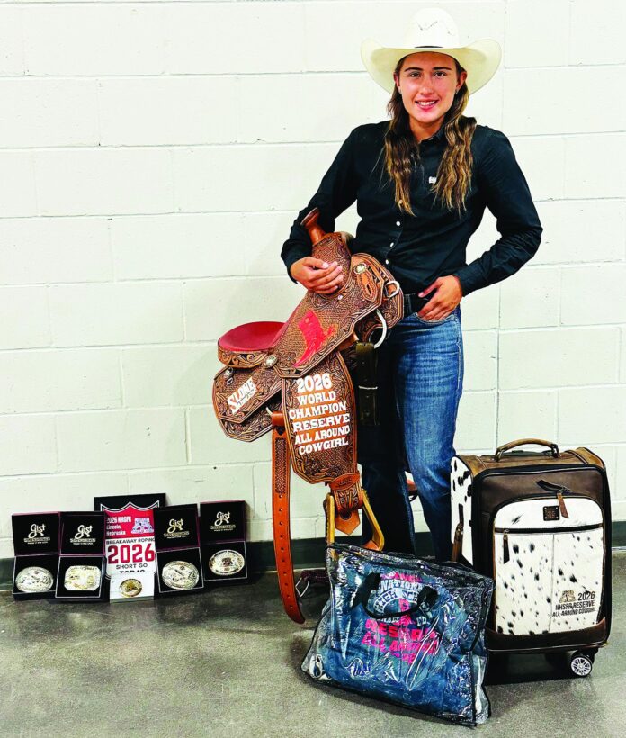 Abiquiú’s Wacey Trujillo is surrounded by the gear she won last week during the 78th annual National High School Finals Rodeo in Lincoln, Nebraska, where she was the girls All-Around reserve champion.