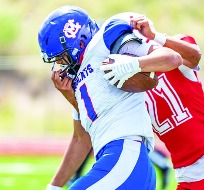 Bruising McCurdy senior running back Derek Dean (left) is being counted to provide power in the Bobcats backfield this year.