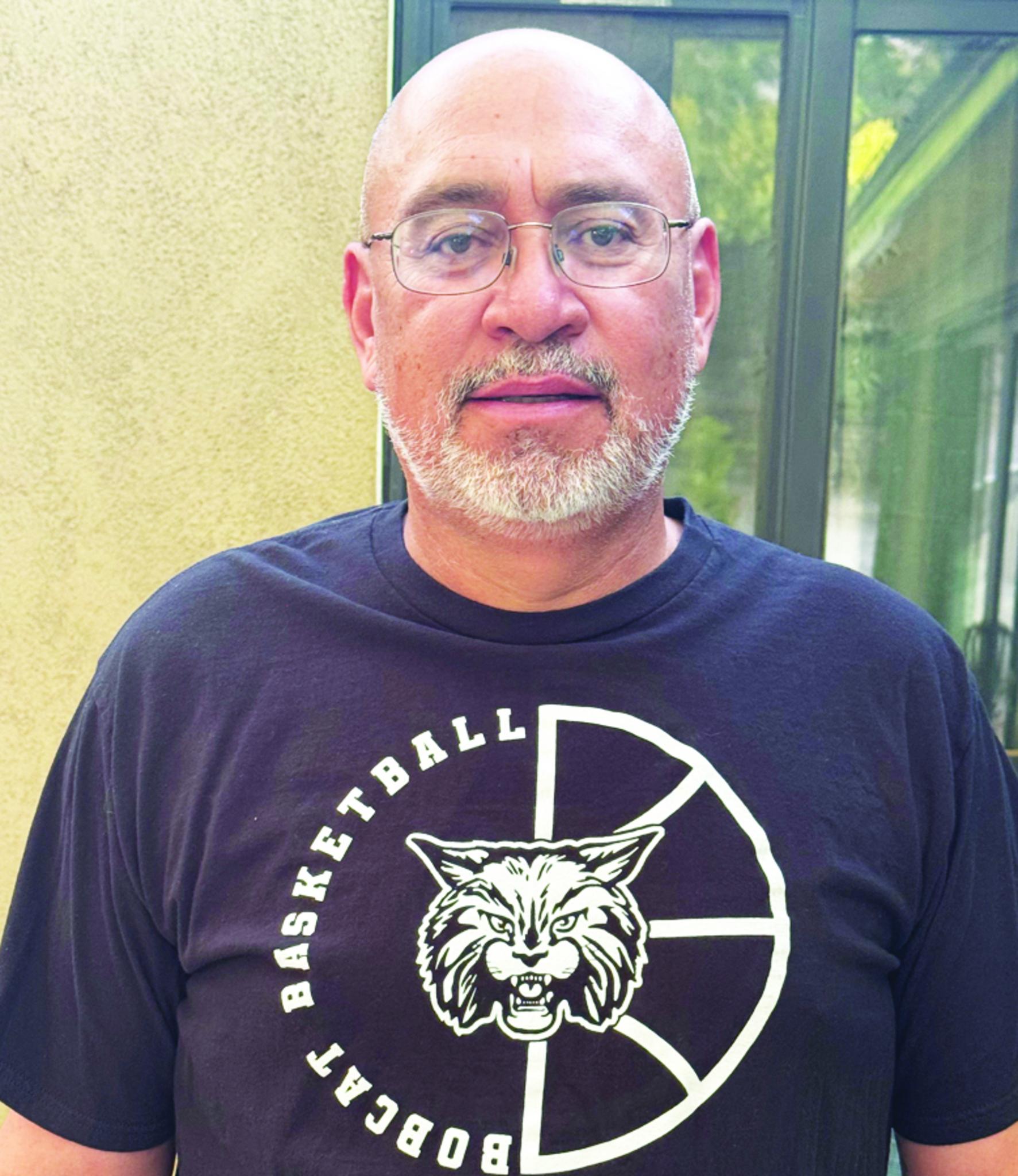 Bustos Takes McCurdy Hoops Reins