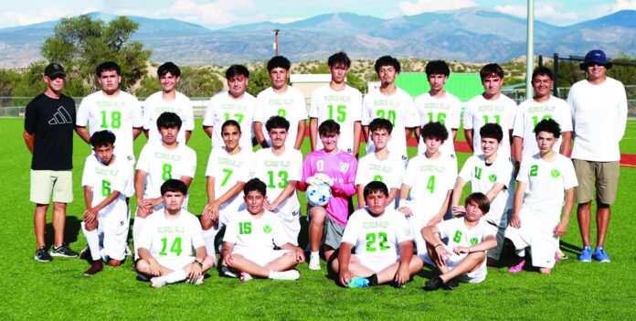 It has been a tough couple of years for the Pojoaque Valley boys soccer team, but the Elks are under new leadership and enthusiastic about a new start. The team is: Coach David Mowry (top row, left), Carlos Terrazas, Josh Gomez, Roman Enriquez, Marco Caballero, Jeremiah Herrera, DMarco Gutierrez, Isequel Villegas, Julian Caballero, Yair Guzman, assistant coach Jeff Saiz; Orlando Rosales (middle row, left), Joel Nunez, Mateo Ulibarri, Andres Martinez, Zackaria Carian, Sean Herrera, Samuel Mowry, Everett Hands, Fabian Sinaloa; Jeremy Rendon (bottom row, left), Harlin Lujan, David Cervantes and Eric Ramos.