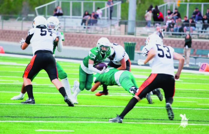 The Pojoaque Elks beat the Aztec High Tigers Friday (9/4) night, to win their homecoming game.