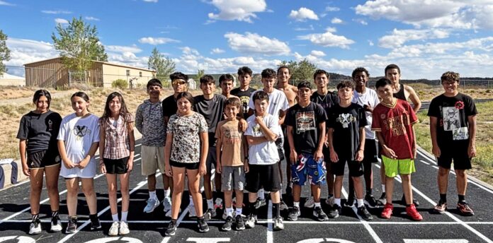 Expectations are high for both the boys girls cross country teams at Mesa Vista. The teams are: Penelope Rodriguez (left) , Alexandra Archuleta, Esperanza Martinez, Brooklyn Jaramillo, Dom Lopez, Jonathan Martinez, Ezequiel Nevarez, Noah Ortiz, Cruzito Martinez, Zachary Trujillo, Miguel Gallegos, Hunter Garcia, Sam Epling, Xavier Lopez, Jonathan Tafoya, Jude Cervantes, Eli Green, Jordan Gallegos, Kasen Romero, Noah Chavez. Not Pictured, Andres Valdez, Ariana Epling, Rebecca Lopez, Isabella Gallegos, Faith Gallegos, Audreena Martinez, Lorenzo Lucero, Armando Martinez, Alexander Trujillo, Johnny Garcia, Magaly De La Cruz, Mirella De La Cruz, Alonzo Vigil and Bethany Epling.