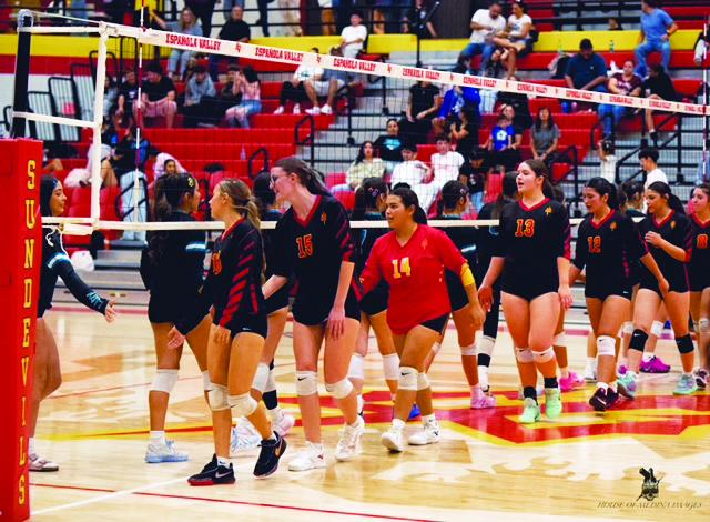 The Española Valley High School Lady Sundevils congratulate the Capital High School Lady Jaguars after their 3-1 victory Sept. 21 at Edward Medina Gymnasium.