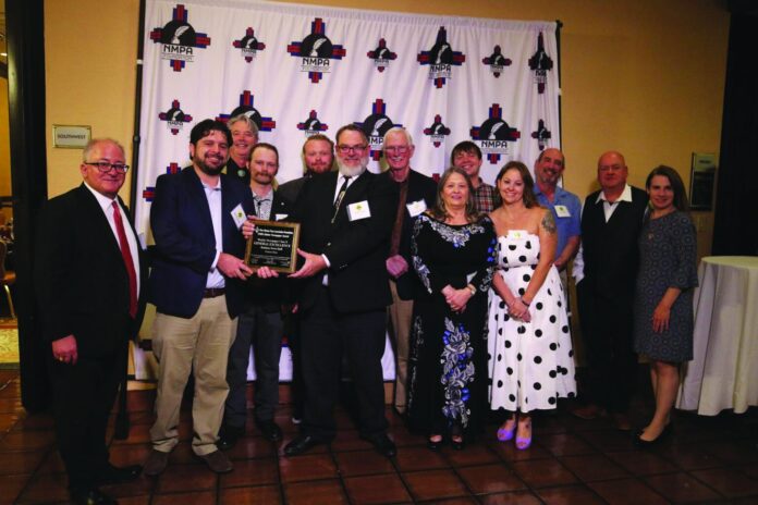 El Rito Media staff pose with their awards, Oct. 17, at the Crowne Plaza in Albuquerque.